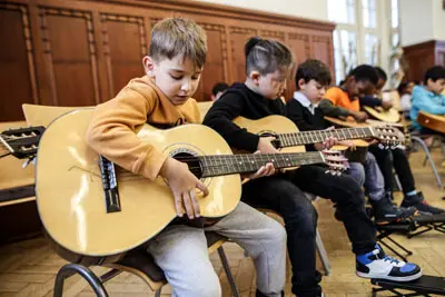 UebehausKray_Integrationsarbeit durch kulturelle Bildung musikalische Ferienangebote Musikunterricht 50 Jahre DEICHMANN Stiftung - Helfen, entwickeln und Teilhabe ermöglichen